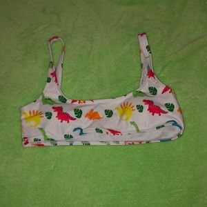 Two bathing suit tops and lace bralet